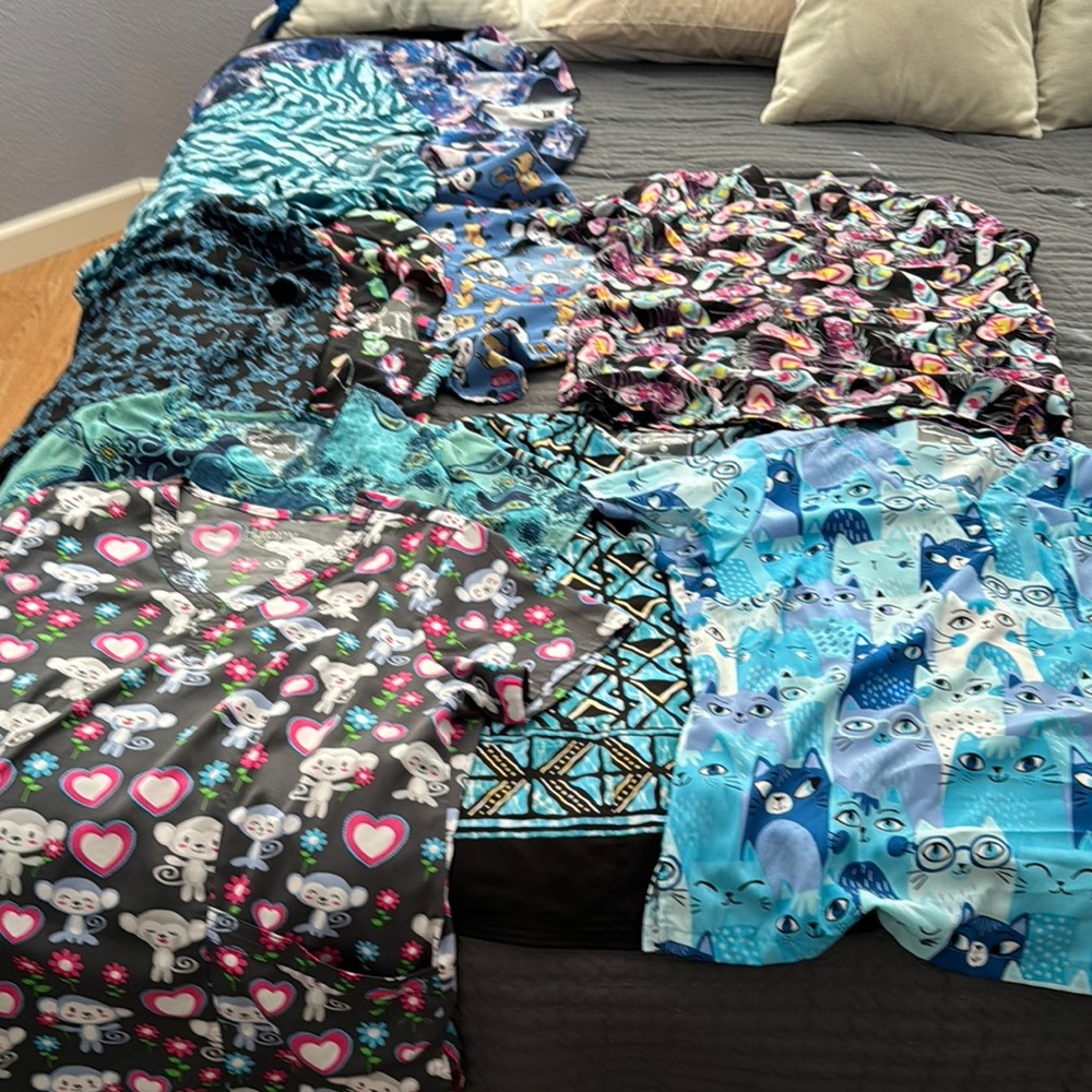 Large women’s Colorful Animal Print Scrub Tops. Like new.